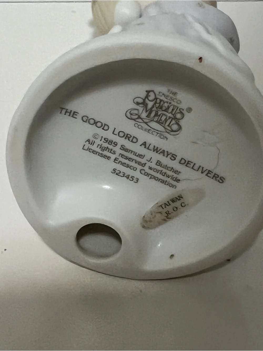 Precious Moments figurine “The Good Lord Always Delivers” from 1989